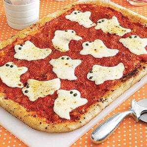 Spooky pizza with cheese ghosts